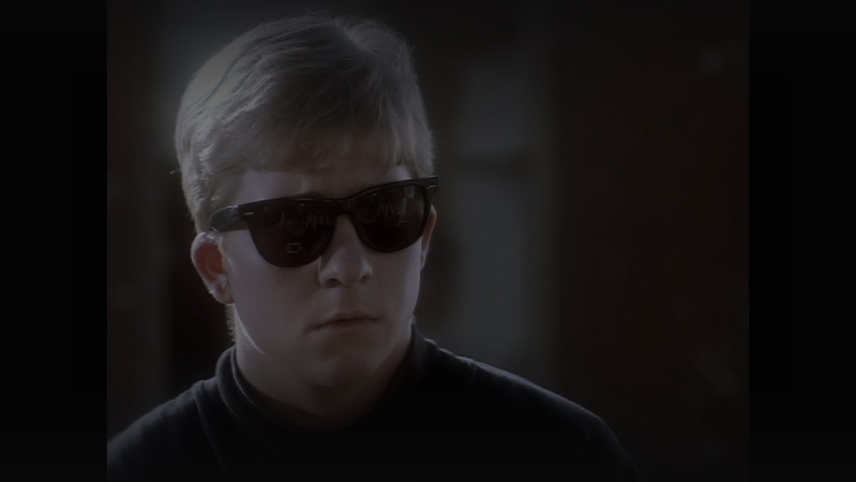 Still from arcade (1993) — blu-ray screencap (source luma 41.5, pre-brightened 1.20, baked 21.1)